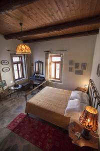 Giường trong phòng chung tại Kallimento-Dimitra