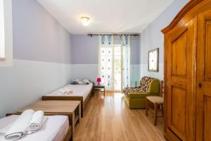 Postel nebo postele na pokoji v ubytování Cozy Apartment Branka with nice Garden