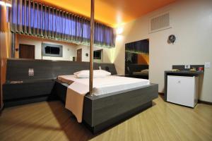 Η κουζίνα ή μικρή κουζίνα στο STATUS Motel