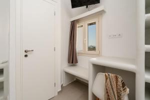 Postel nebo postele na pokoji v ubytování Bee Naxian House
