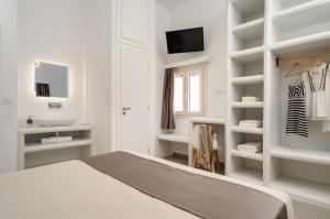 Postel nebo postele na pokoji v ubytování Bee Naxian House
