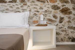 Postel nebo postele na pokoji v ubytování Bee Naxian House