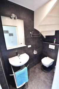 Ένα μπάνιο στο Vrijvakantiehuis Houtenburgseweg 2