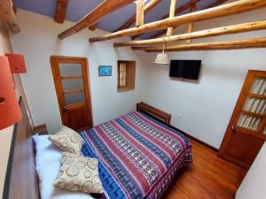 Postel nebo postele na pokoji v ubytování Mirador de la Ñusta