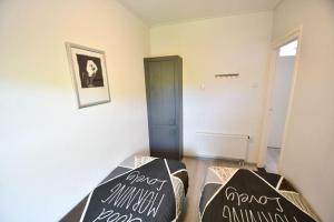 Ένα ή περισσότερα κρεβάτια σε δωμάτιο στο Vrijvakantiehuis Houtenburgseweg 22 +16 φωτογραφίες