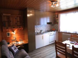 Kuchyň nebo kuchyňský kout v ubytování Haus Bel-Air + 34 fotografií