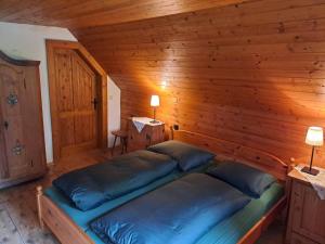 Postel nebo postele na pokoji v ubytování Forsthaus Pracken