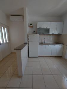 Kuchyň nebo kuchyňský kout v ubytování Apartment Ante