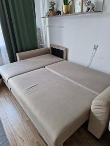 Posteľ alebo postele v izbe v ubytovaní Sienkiewicza apartament MULTI HOUSE