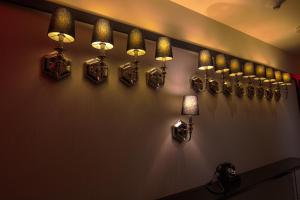 a room with many lights on a wall at The Evelyn NoMad in New York