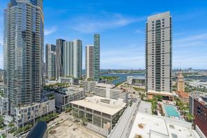 an aerial view of a city with tall buildings at Devereaux Miami Luxury One-Bedroom and Studios in Miami