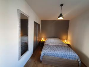 Postel nebo postele na pokoji v ubytování Appartement cosy Parc Thermal