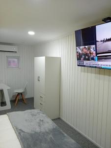 TV a/nebo společenská místnost v ubytování Hostal 1009 Valdivia