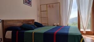 Łóżko lub łóżka w pokoju w obiekcie Villa Dolce Havana con piscina