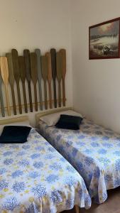 Łóżko lub łóżka w pokoju w obiekcie Villa Dolce Havana con piscina