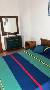 Łóżko lub łóżka w pokoju w obiekcie Villa Dolce Havana con piscina