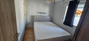 En eller flere senge i et værelse på 4Seasons