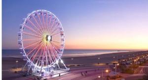 a ferris wheel on the beach at dusk at tente pour 4 personnes in Saint-Jean-de-Monts