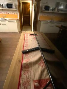 two chopsticks sitting on a table in a kitchen at Maison Maribel 0043 in Pré-Saint-Didier