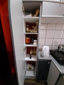 Una cocina o zona de cocina en Apartman Mima