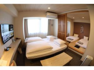 Lova arba lovos apgyvendinimo įstaigoje Hotel Torifito Kashiwanoha - Vacation STAY 75946v