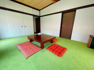 Giường trong phòng chung tại Yuraku Izu-Oshima - Vacation STAY 44725v +92 ảnh