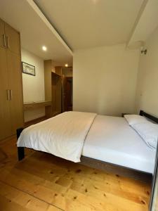 Letto o letti in una camera di B&B Botel Charlie