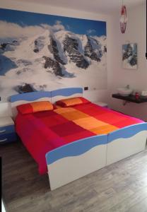 Postel nebo postele na pokoji v ubytování Grandi Cime Guest House