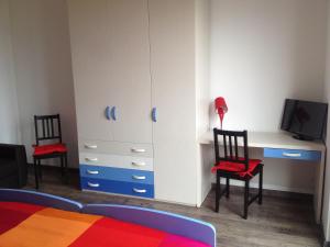 Postel nebo postele na pokoji v ubytování Grandi Cime Guest House