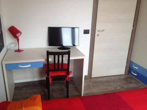 TV a/nebo společenská místnost v ubytování Grandi Cime Guest House