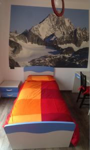 Postel nebo postele na pokoji v ubytování Grandi Cime Guest House