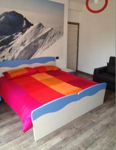 Postel nebo postele na pokoji v ubytování Grandi Cime Guest House