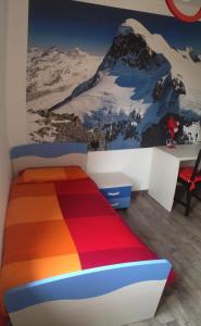 Postel nebo postele na pokoji v ubytování Grandi Cime Guest House