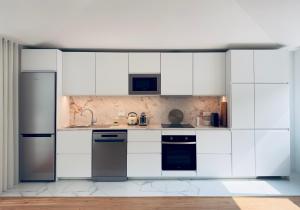Cucina o angolo cottura di Vibrant Host Solutions-Campo 24 Agosto