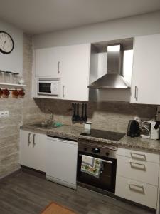 Kuchyň nebo kuchyňský kout v ubytování Casa vacacional