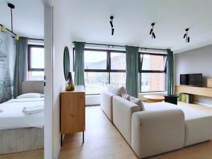 Turnau City Aparthotel客房内的一张或多张床位