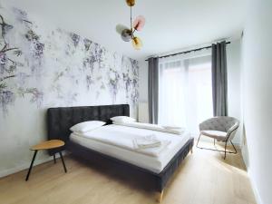 Turnau City Aparthotel客房内的一张或多张床位
