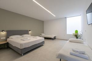 Posteľ alebo postele v izbe v ubytovaní Villas 107 - Homeleader