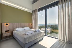 Posteľ alebo postele v izbe v ubytovaní Villas 107 - Homeleader