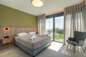 Posteľ alebo postele v izbe v ubytovaní Villas 107 - Homeleader