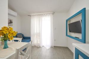Televízia a/alebo spoločenská miestnosť v ubytovaní Apartment Mavarstica 17803f