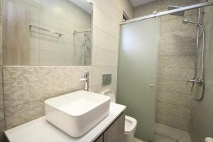 Koupelna v ubytování Nefeli Apartment + 37 fotografií