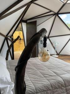 a room with a bed in a tent at Glamping ecoglam Medellín in Copacabana