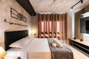 Giường trong phòng chung tại LA6 Studio Aconchegante Com Acesso Rápido ao Metrô