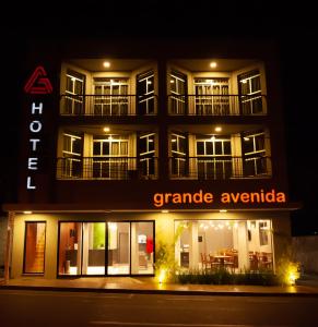 a rendering of a grand avenue hotel at night at Grande Avenida Hotel in Patrocínio