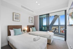 Jewel Beachfront Residences客房内的一张或多张床位