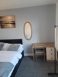 A bed or beds in a room at No 1 Decent Homes- Quiet double bedroom