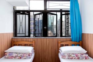 Katil atau katil-katil dalam bilik di Ah Shan Hostel