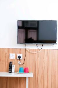Televisyen dan/atau pusat hiburan di Ah Shan Hostel