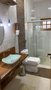 Ein Badezimmer in der Unterkunft Chácara Recanto Wonne